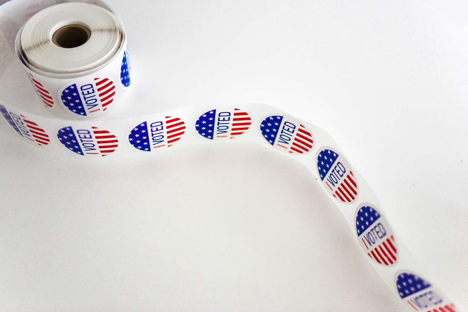 a roll of voting stickers, which can prompt election stress